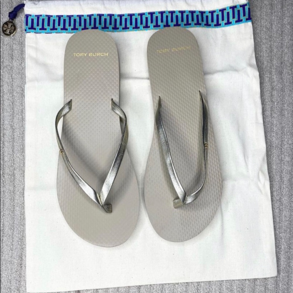 Tory Burch gold flip flops